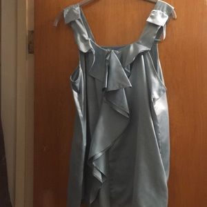 Sleeveless blue silk blouse